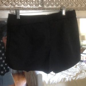Black dress shorts - Pointy over edges on it.
